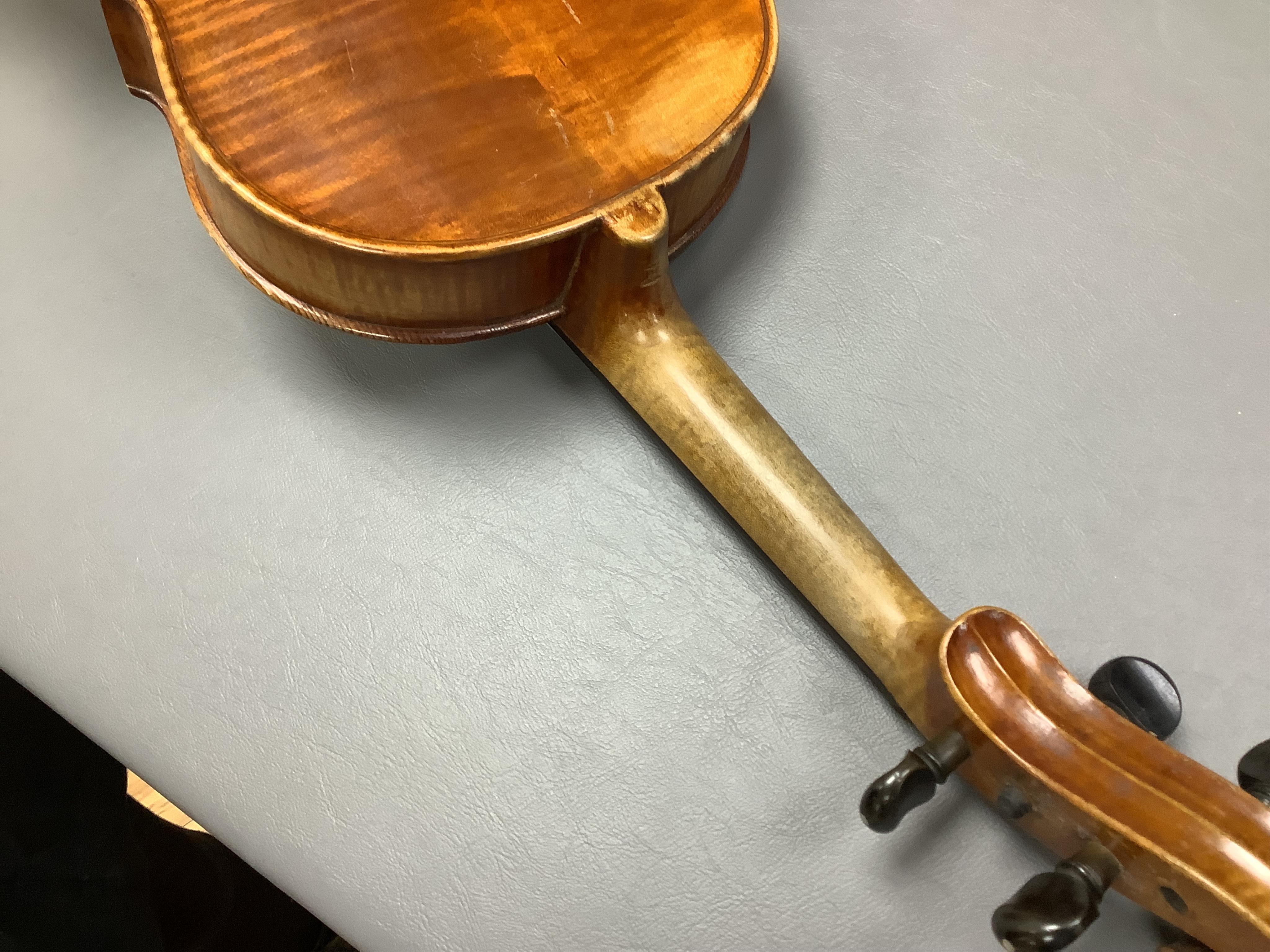 A cased viola, label to interior reads ‘CHR Aug Hammig violin u cellofabrikant, Markneukirchen’, back 39cm. Condition - fair